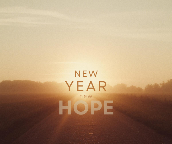 "New Year New Hope" text over a background of road lit with a warm sunrise.
